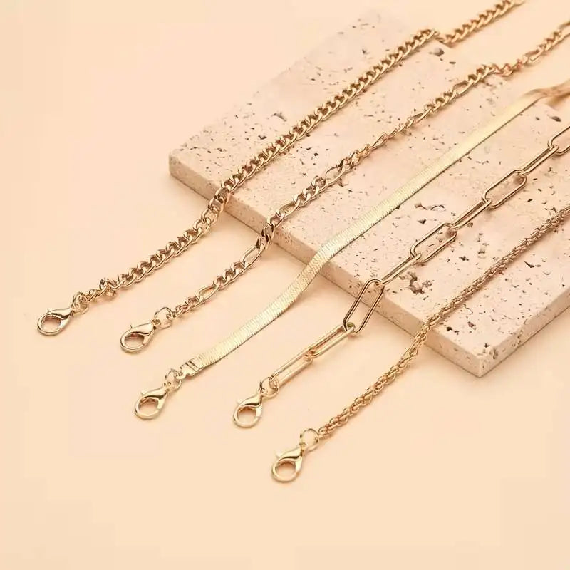 Gold Bracelet Set – 5-piece set, featuring a Cuban chain, bow-tie chain, and simple bracelets. Perfect for everyday wear and gifts, punk-style jewelry collection. Ideal for autumn and winter accessories. Perfect for parties