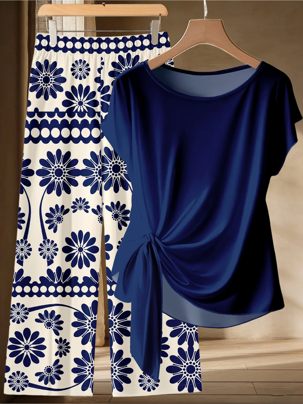 Summer women's plus size casual loose two-piece set solid color twisted T-shirt+blue and white printed wide leg pants set